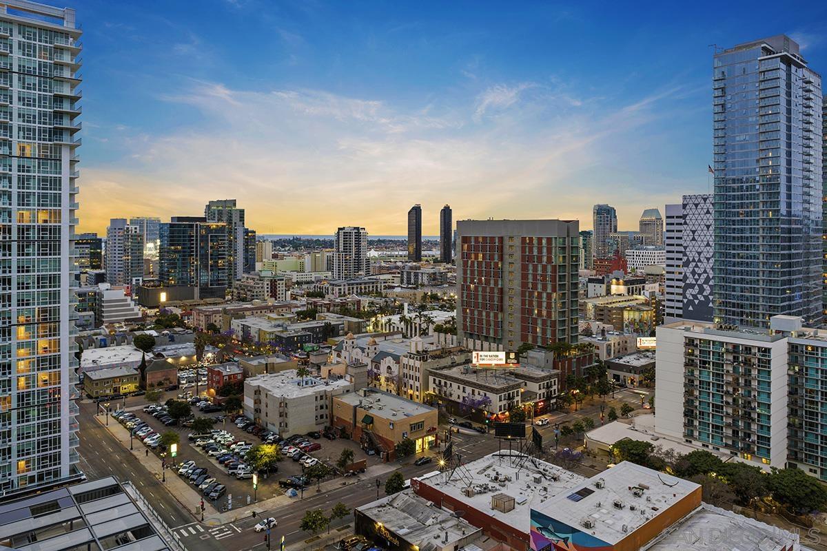 a view of a city with tall buildings