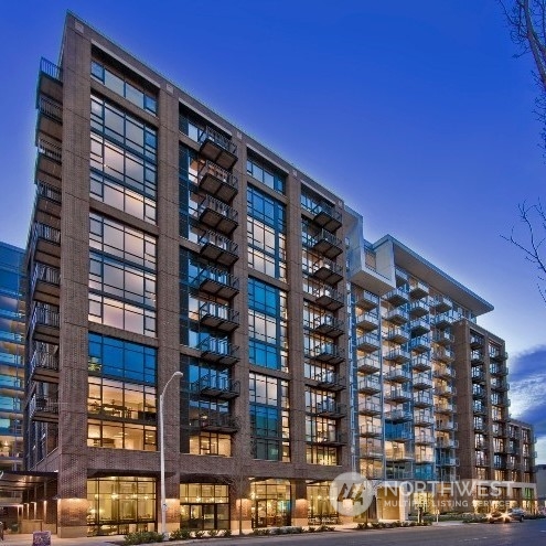 a front view of a building with glass windows