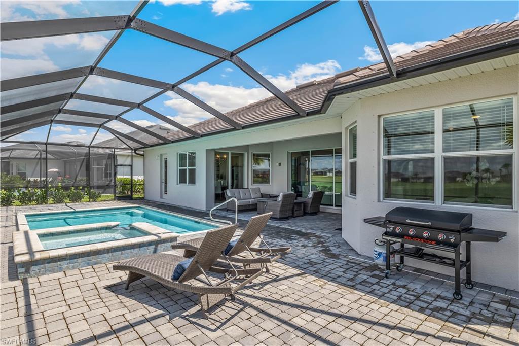 a building outdoor space with patio couches and dining table