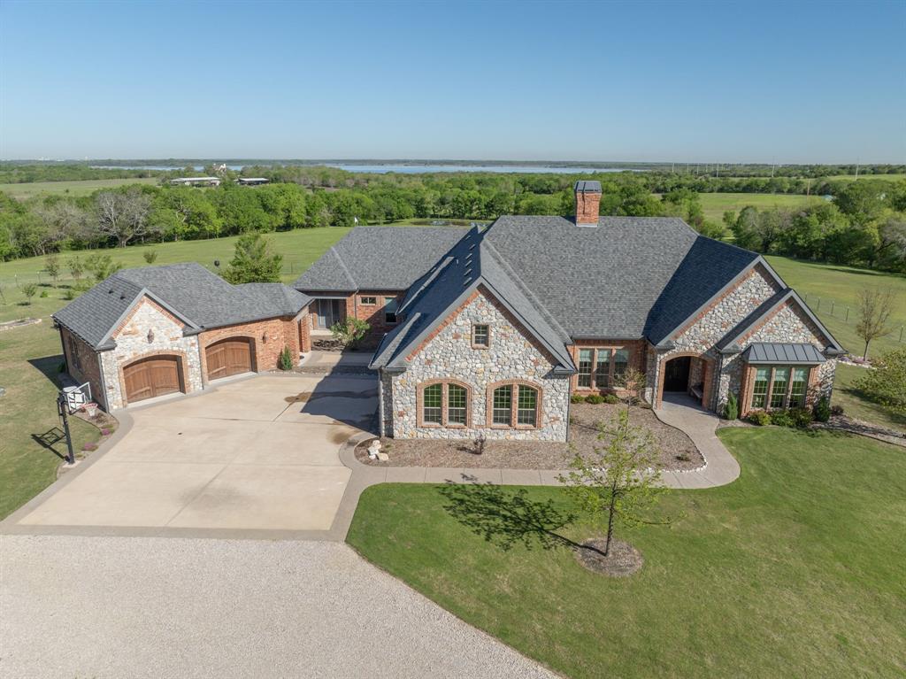 an aerial view of a house with porch