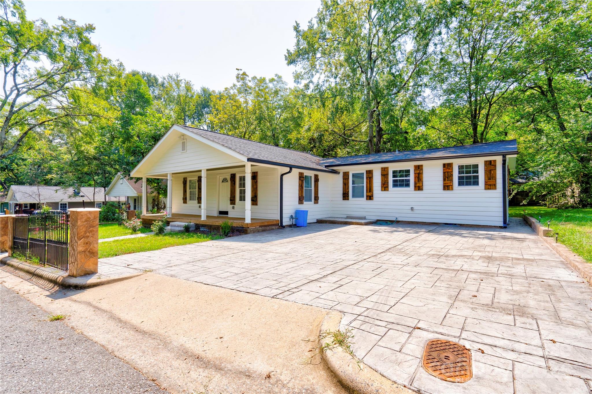 a house with yard in front of it