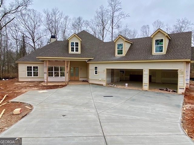 a front view of a house with a garage