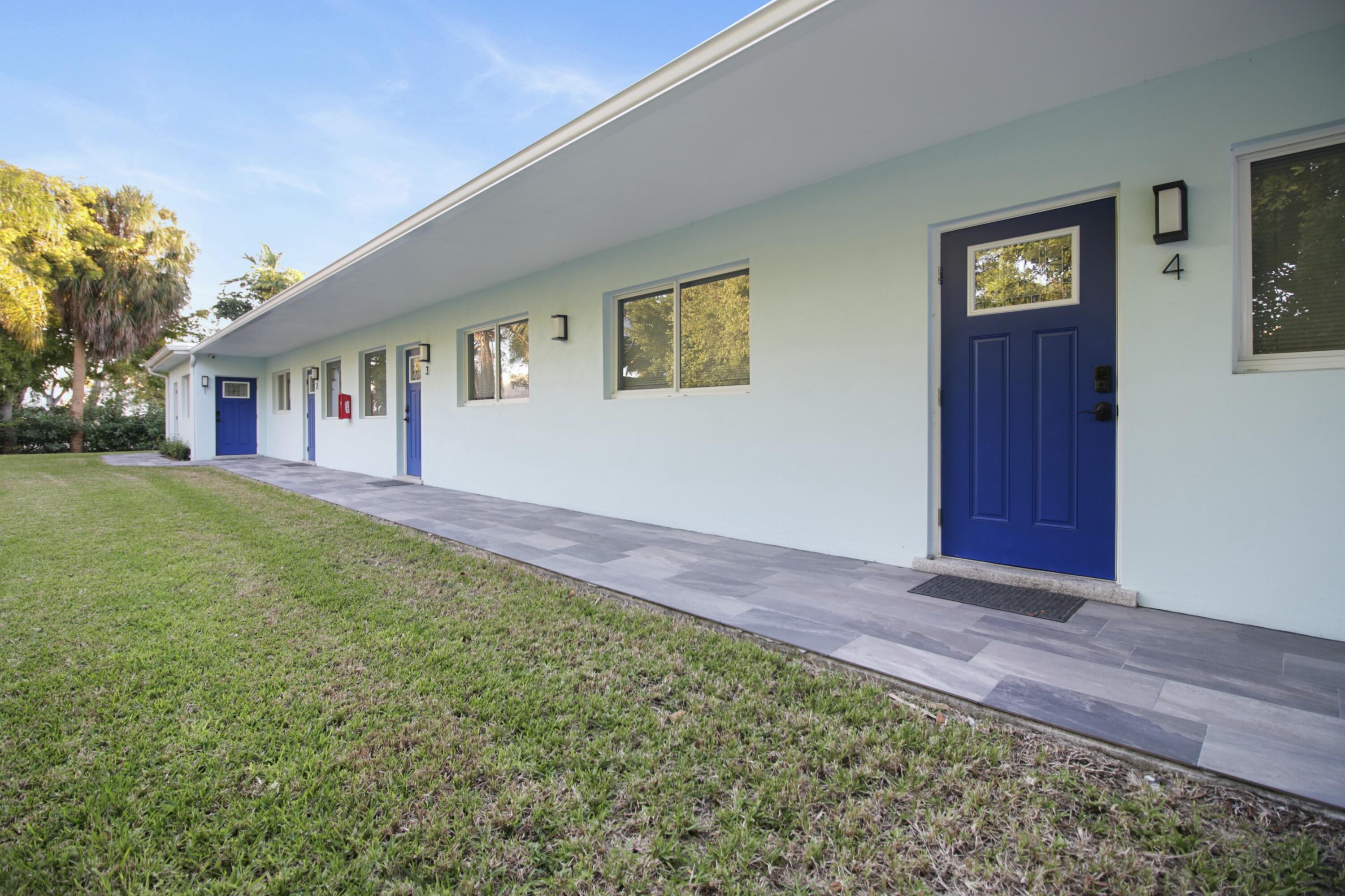 a view of house with yard and entertaining space