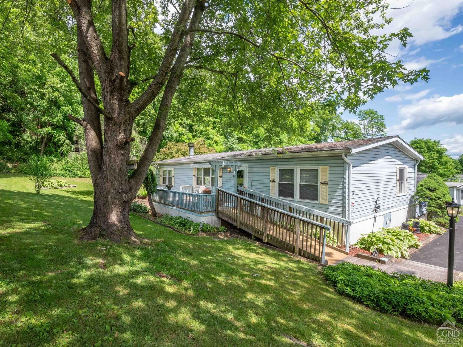 a house with trees in the background