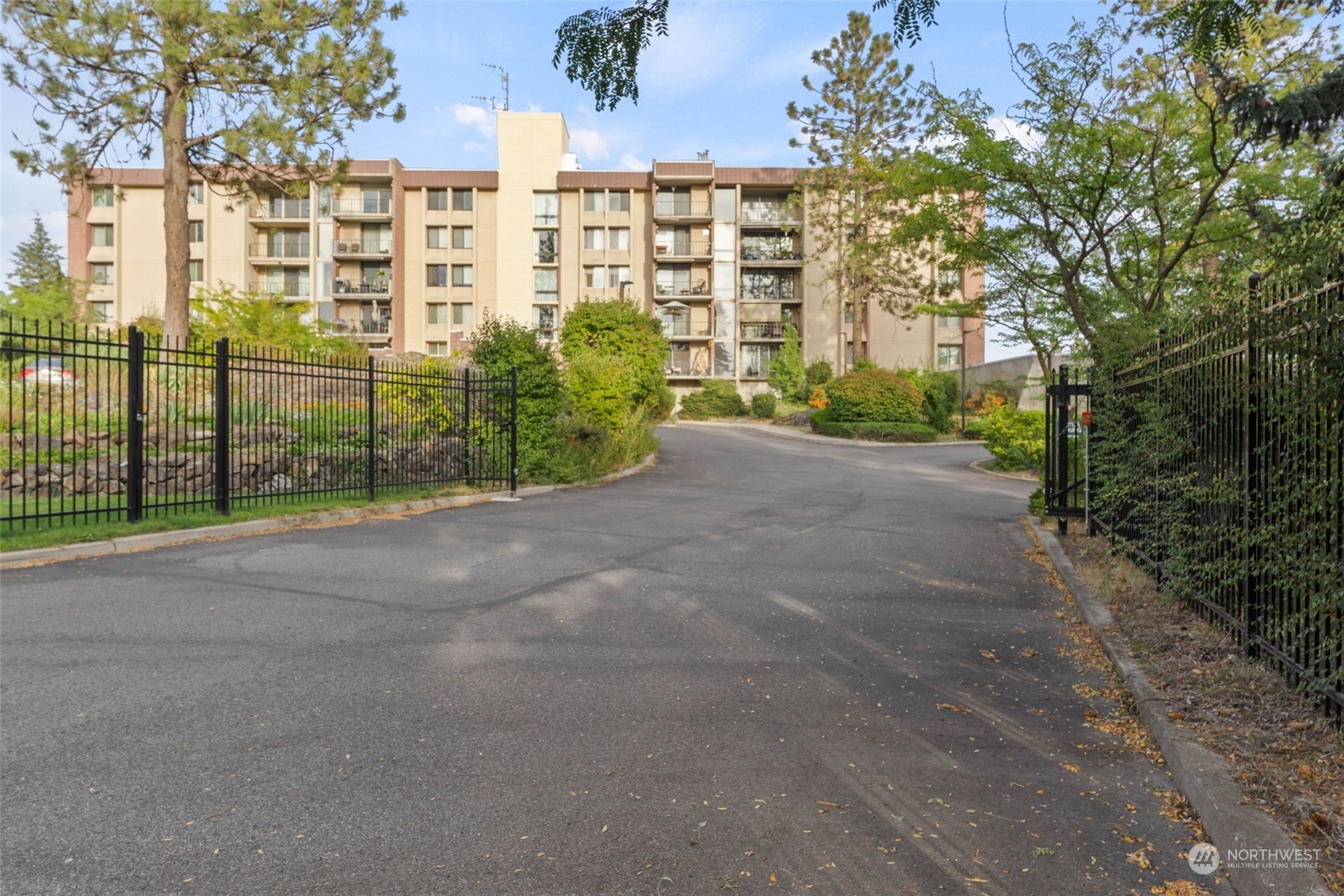 a view of a garden with a building