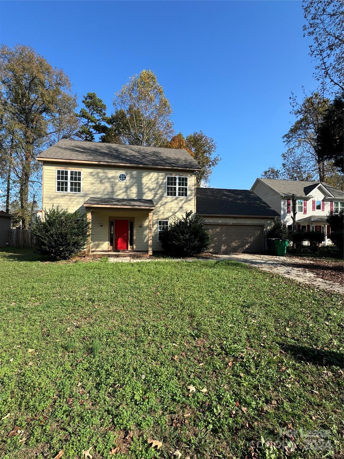 front view of a house with a yard