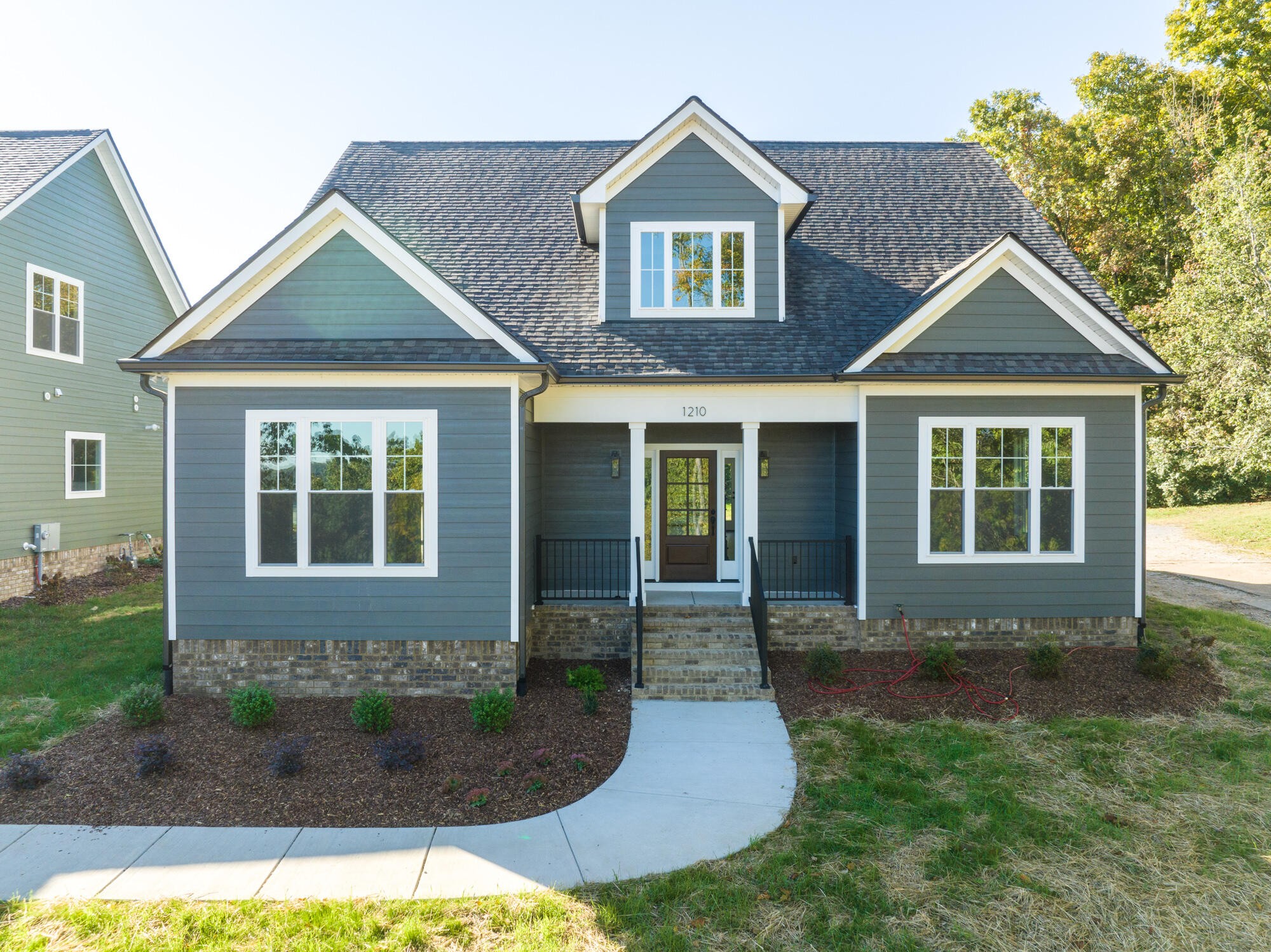 front view of a house and a yard