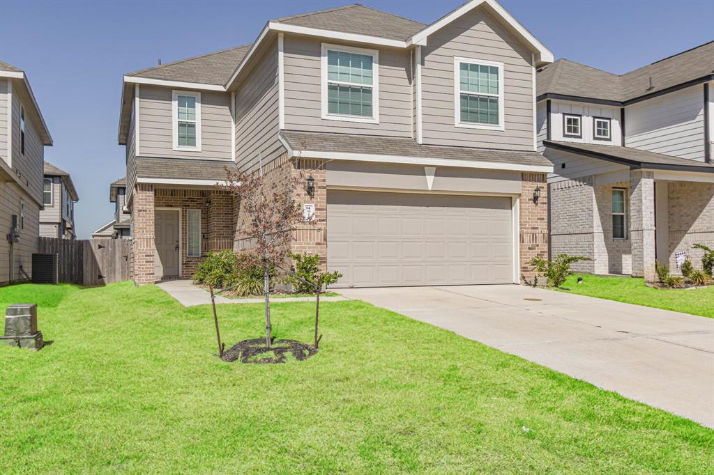 a house view with a garden space