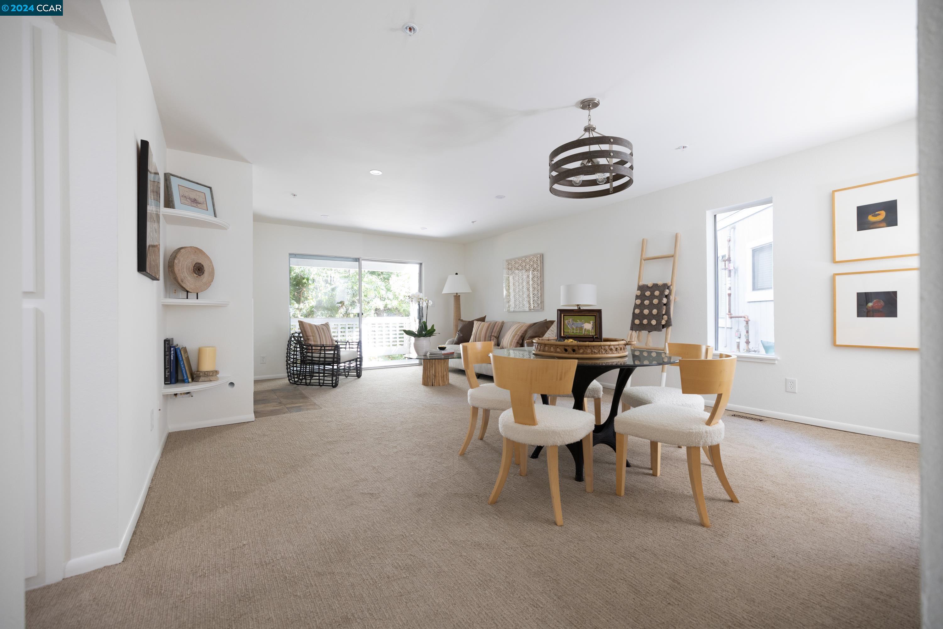 a view of a livingroom with furniture and window