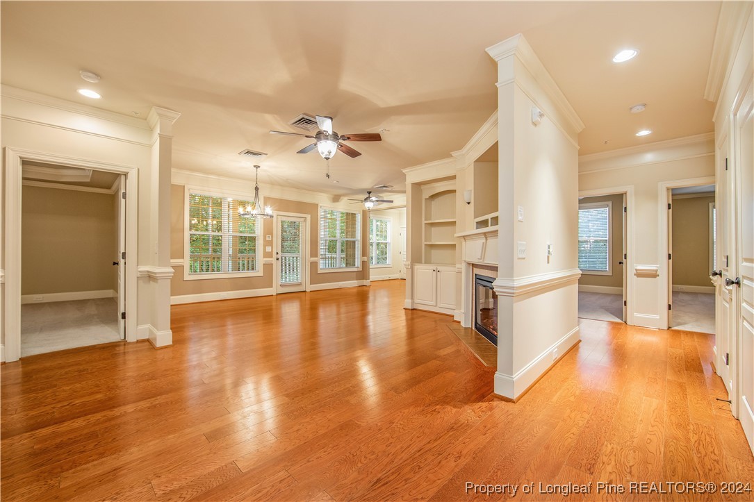 a view of kitchen with furniture and wooden floor