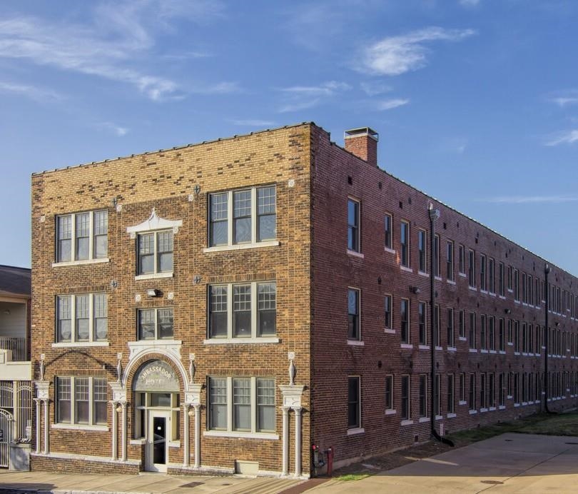 a front view of a building with street view