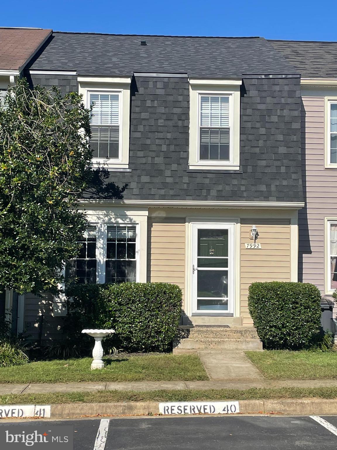 a house view with a garden space