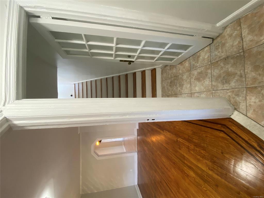 Hall featuring light hardwood / wood-style flooring