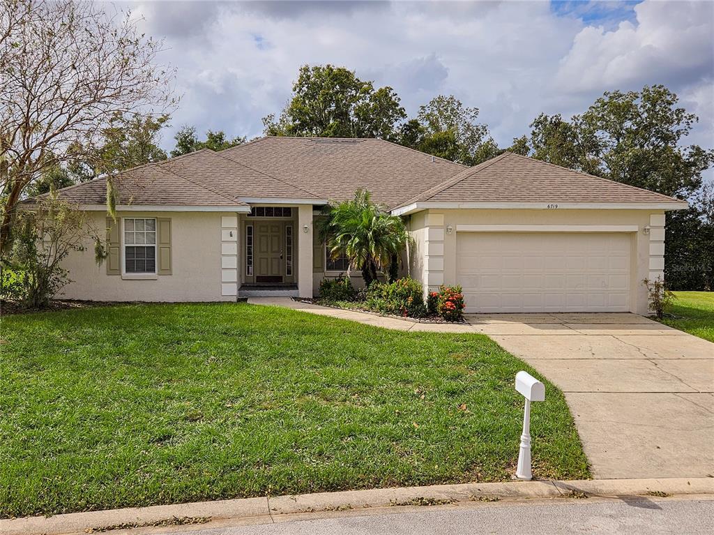 front view of house with a yard