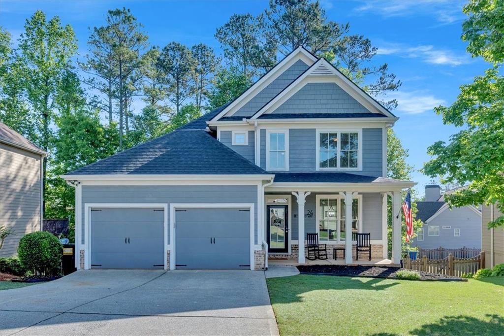 front view of a house with a yard