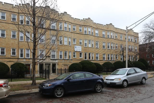 a car parked in front of a building