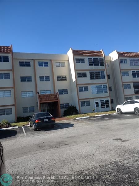 a car parked in front of a building