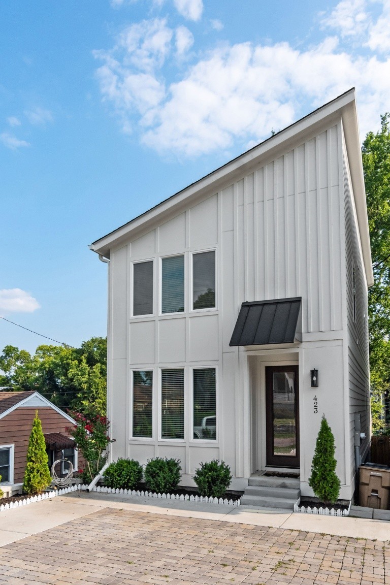 a front view of house with yard