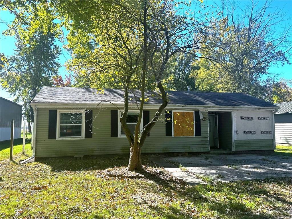 front view of a house with a yard