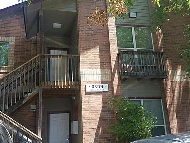 a view of a house with a street view