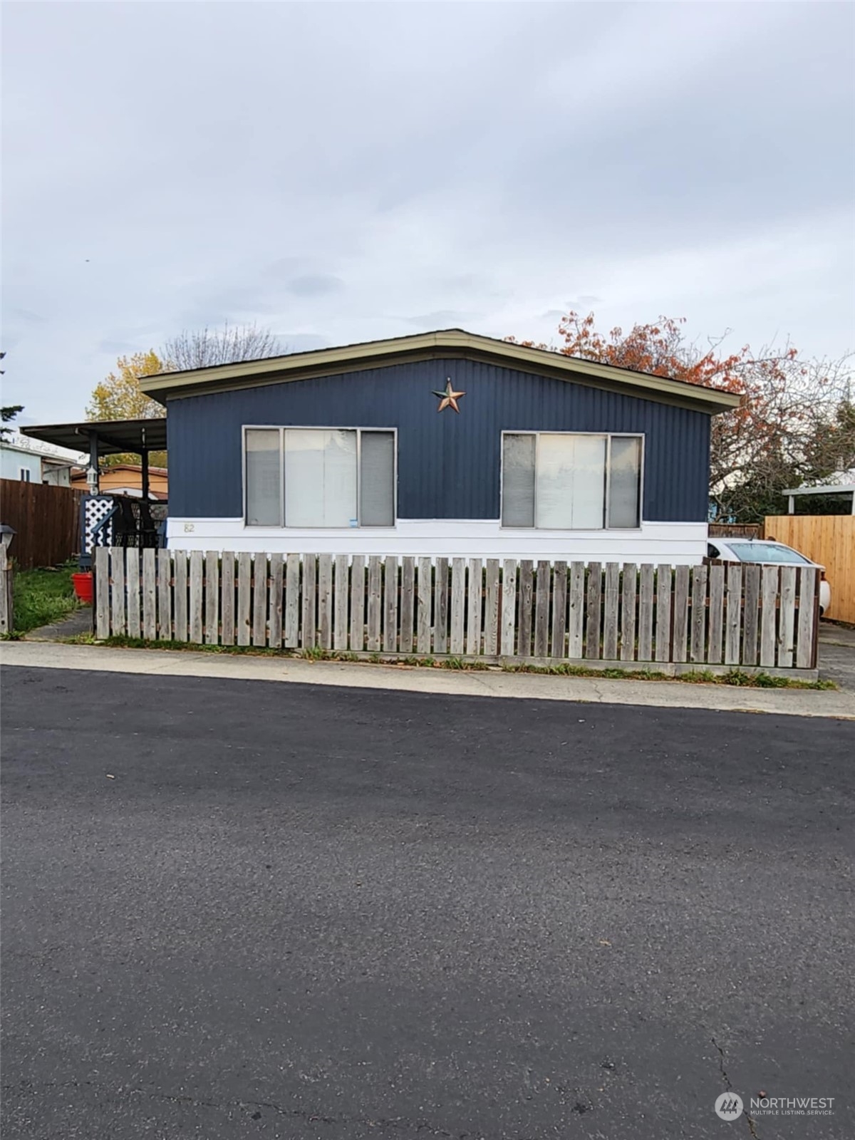 a view of a house with a street