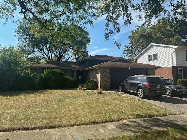 a view of a car parked in front of a house