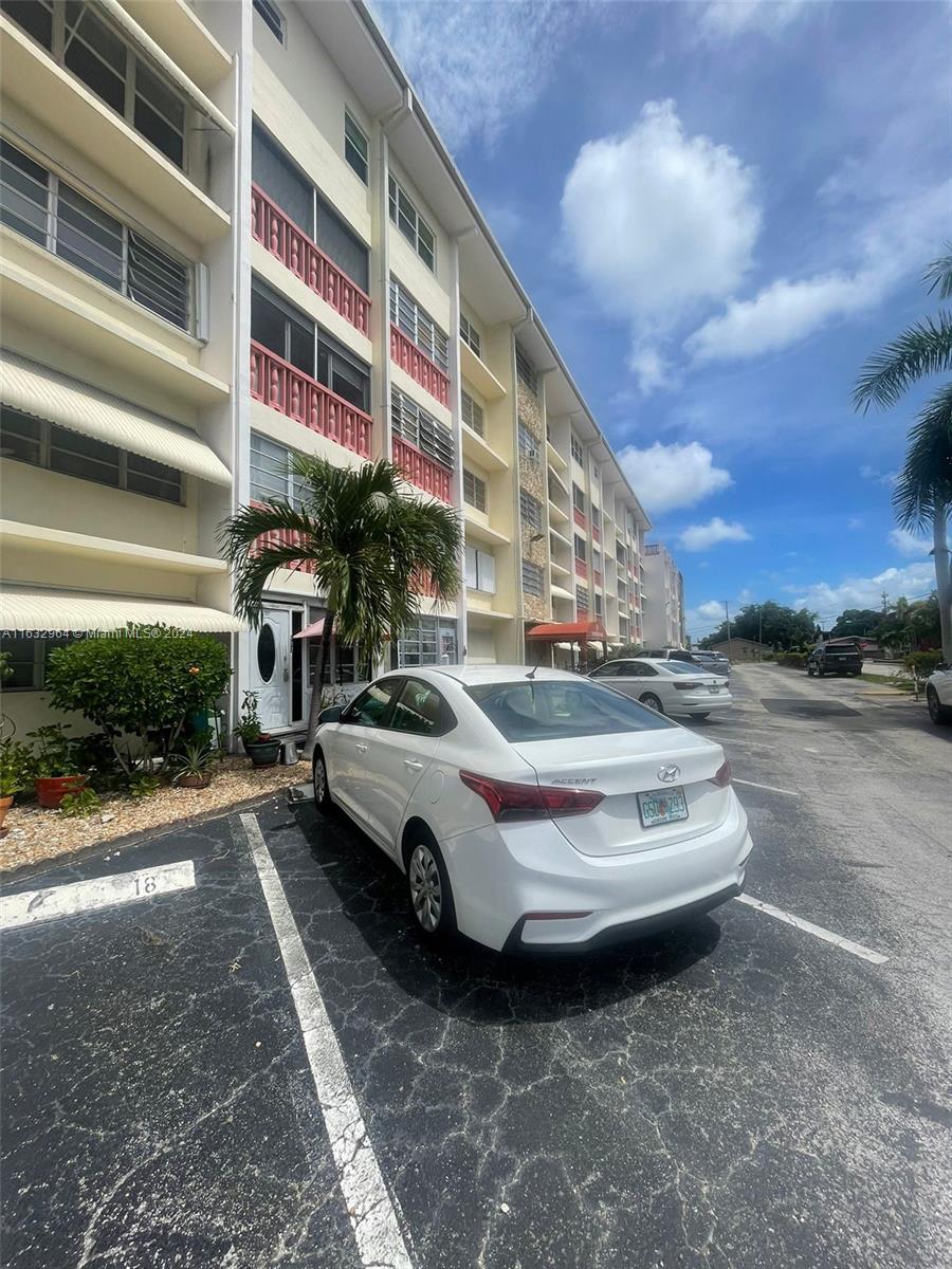 a car parked in front of a building