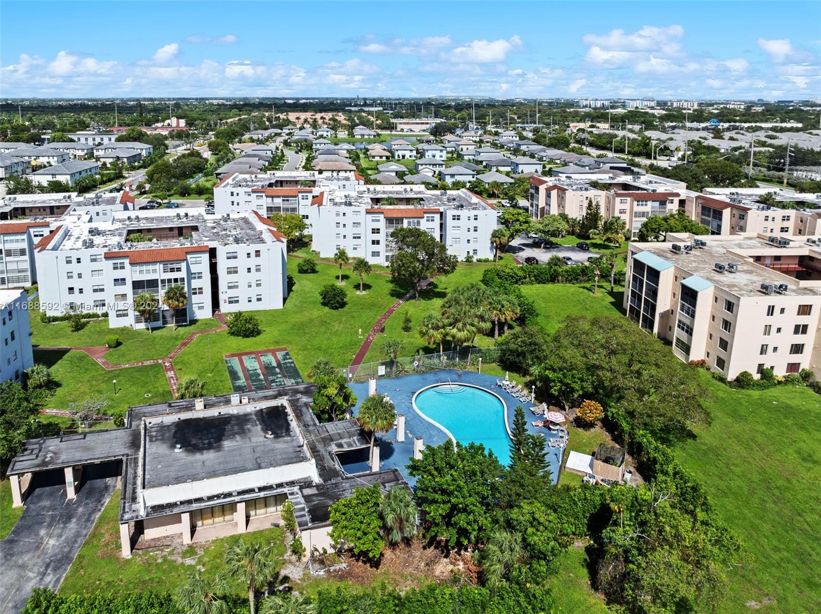 an aerial view of a house with a garden