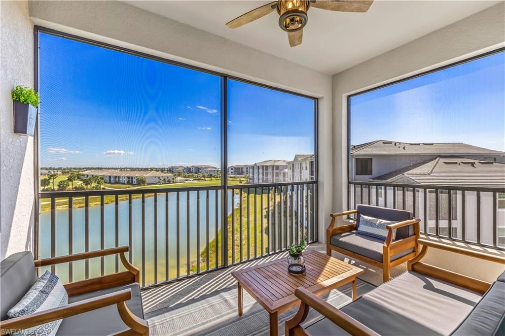 a view of a balcony with furniture