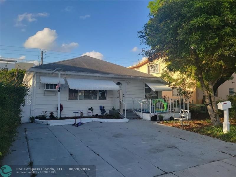 a view of a house with a patio