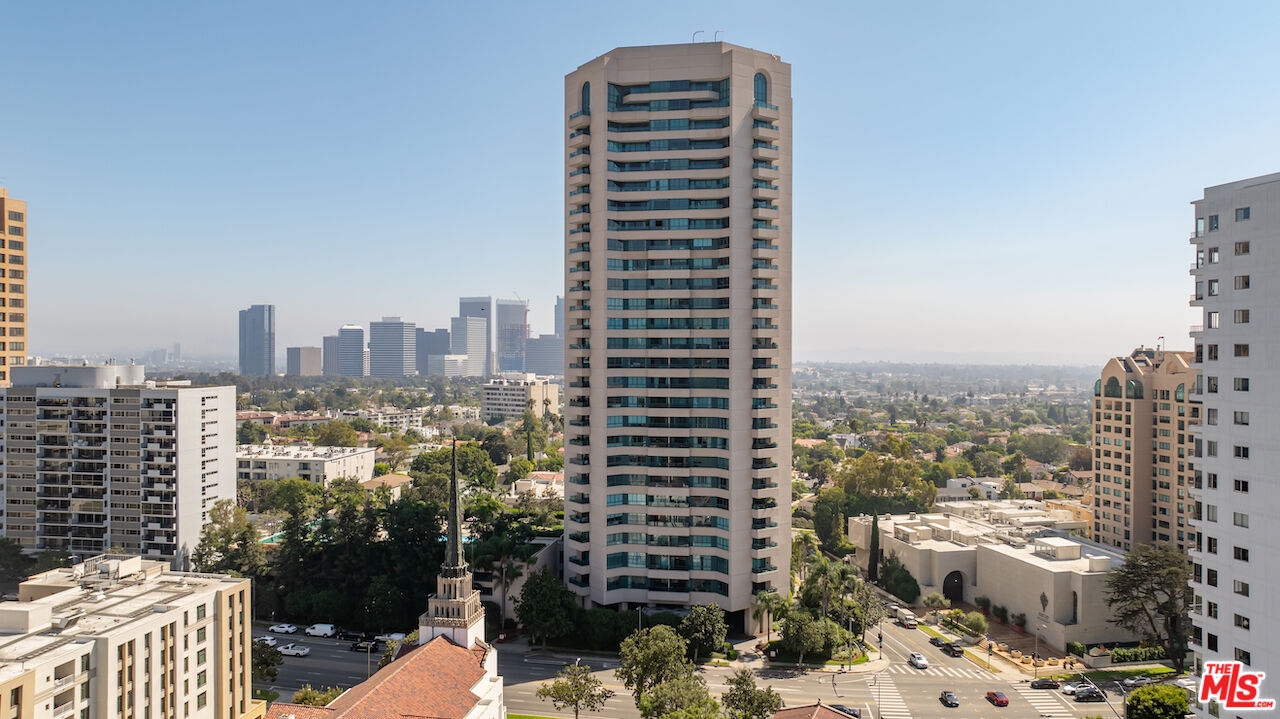 a view of a city with tall buildings