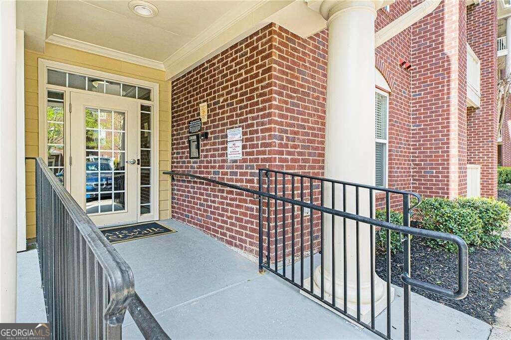 a view of a balcony with wooden floor