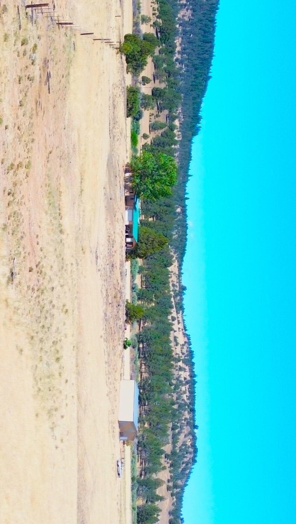 a view of swimming pool and a yard