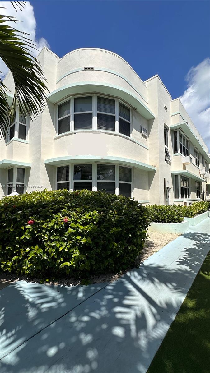 a front view of a multi story residential apartment building