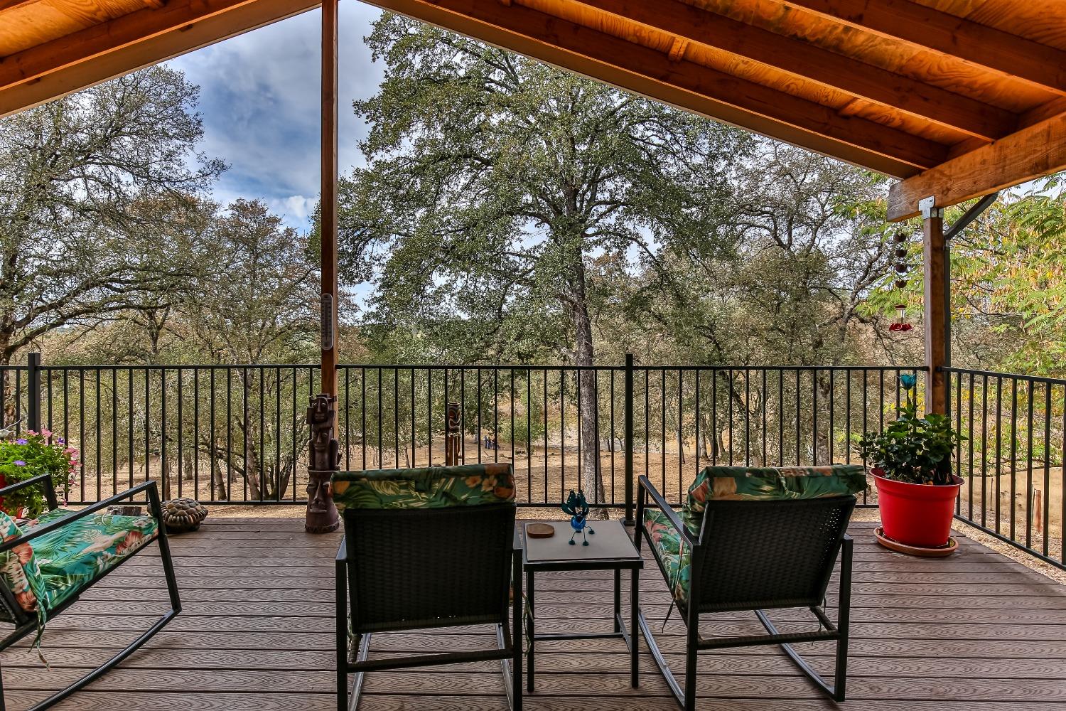 a view of a chairs on the deck