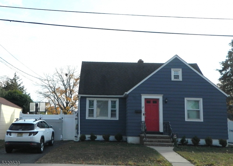 a car parked in front of a house