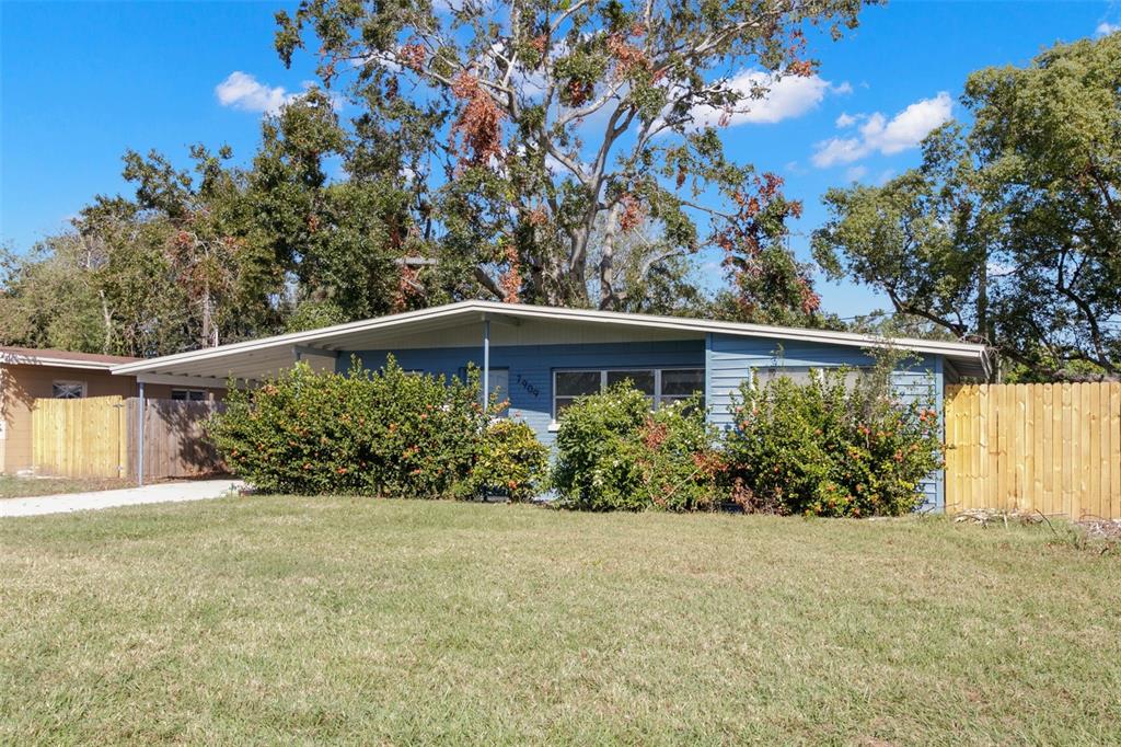 front view of a house with a yard