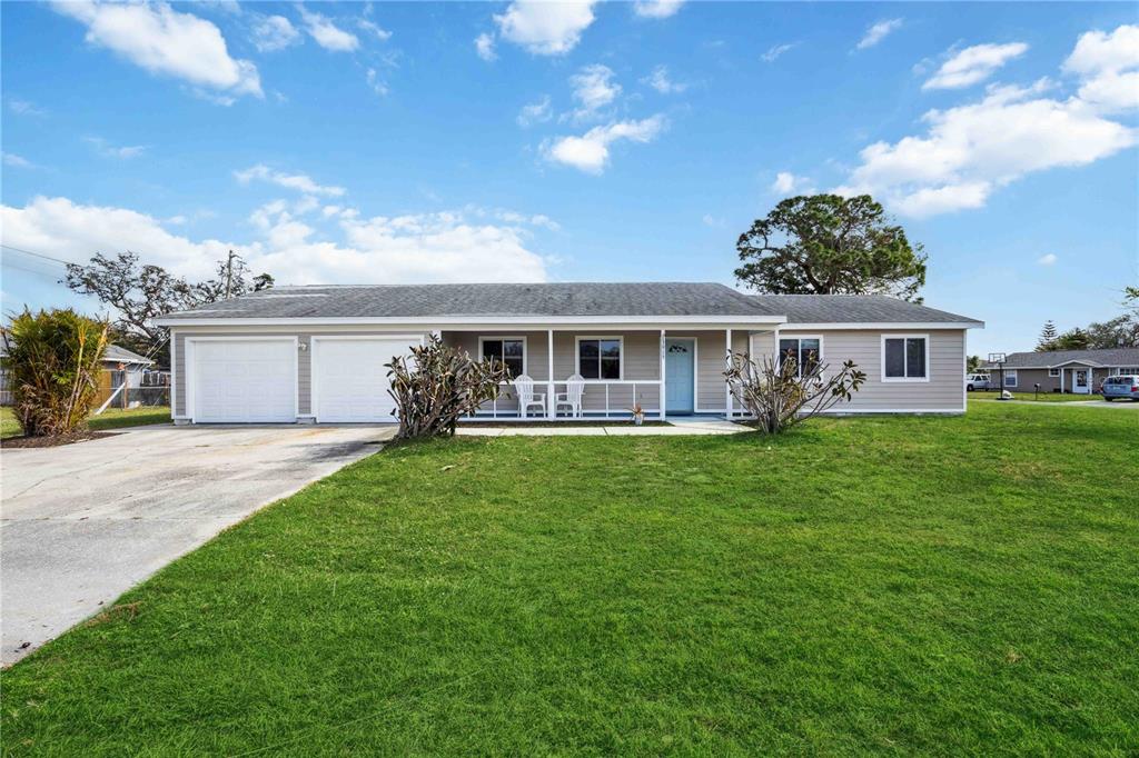 front view of a house with a yard