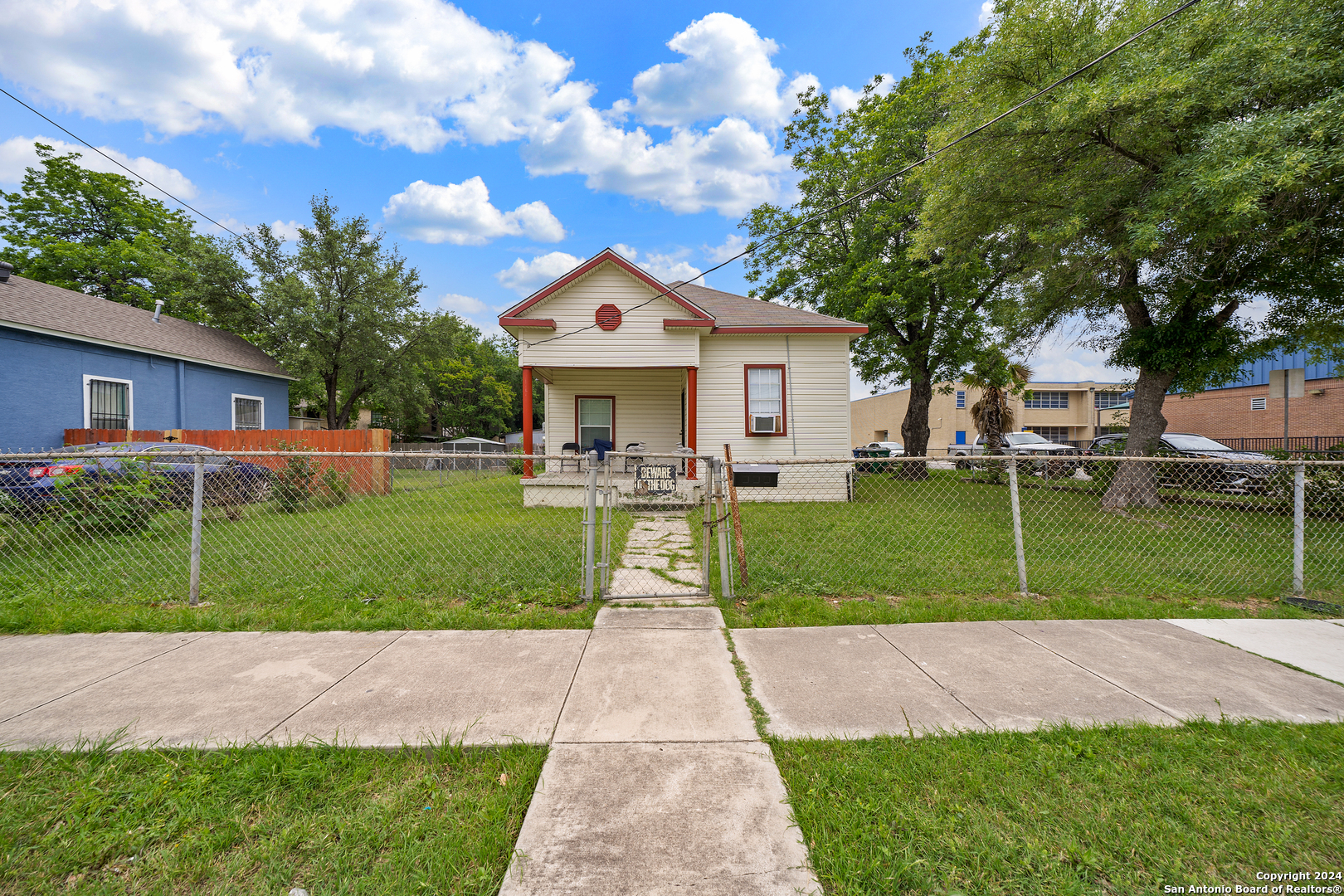 a view of a house with a back yard