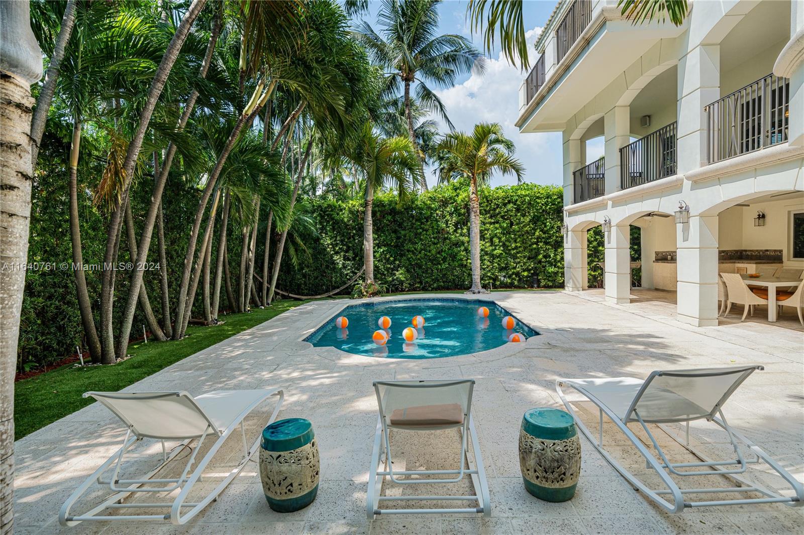 a view of swimming pool with a patio