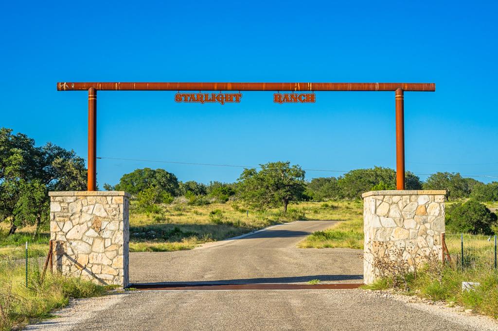 a view of outdoor space with a sign board