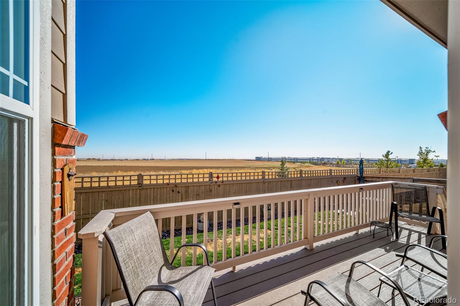 a view of roof deck with city view