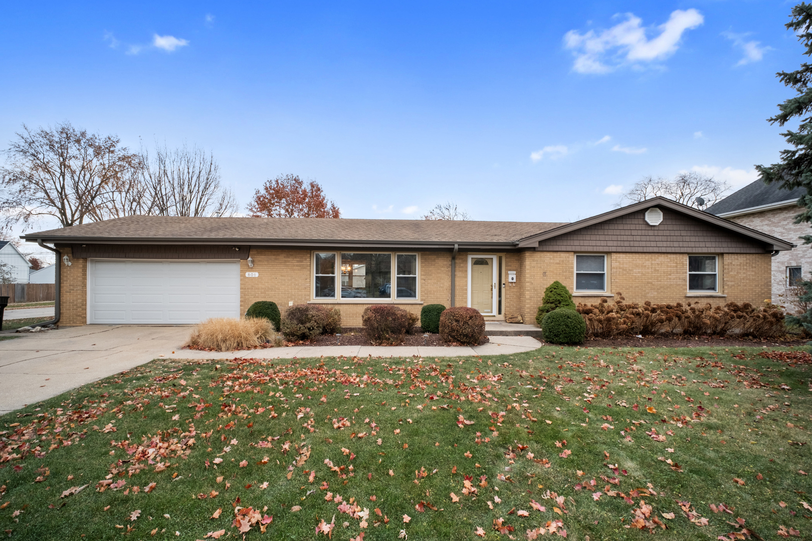 a front view of house with yard outdoor seating and barbeque oven