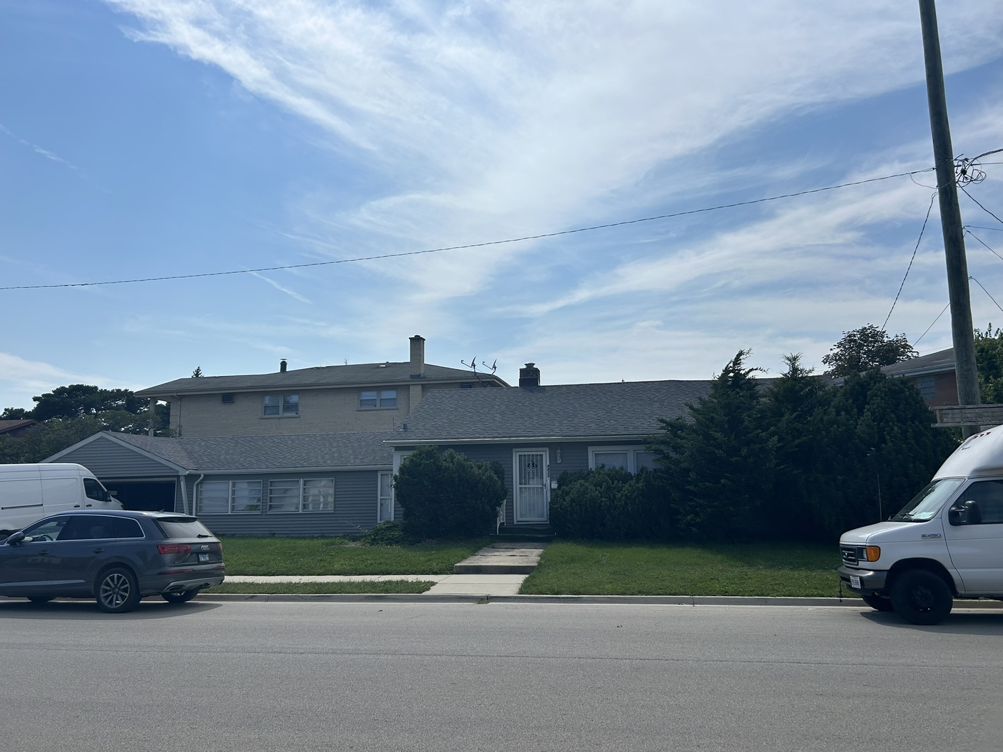 a car parked in front of a house