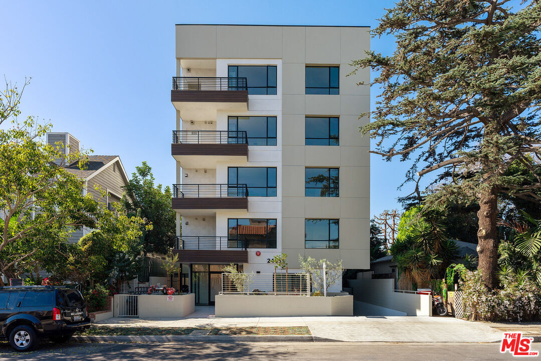 a front view of a building with street view