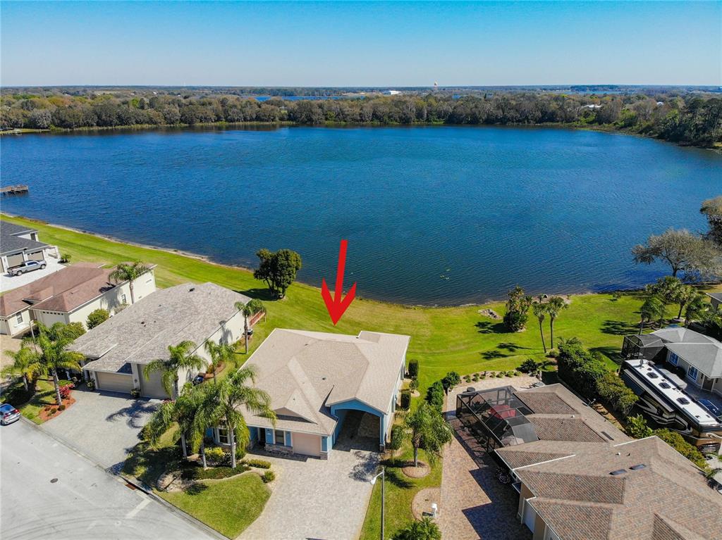 an aerial view of a house with a garden