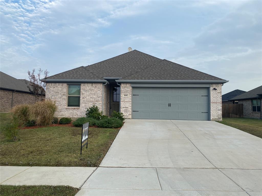 front view of a house with yard