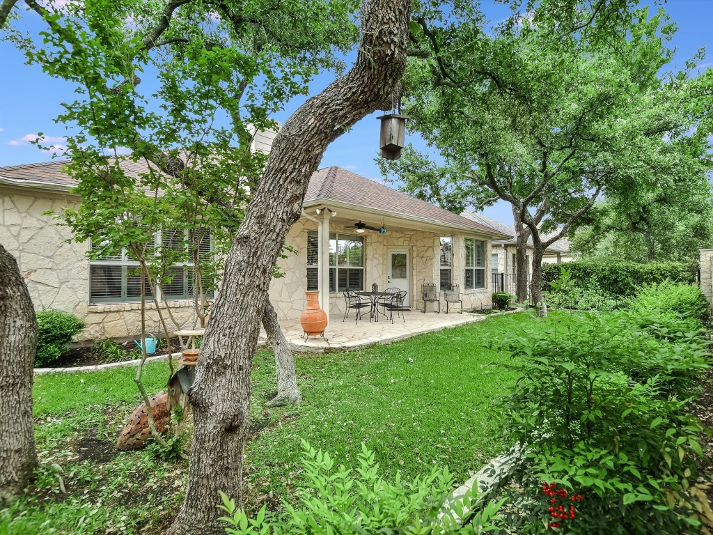 Enjoy this gorgeous, shady back yard!