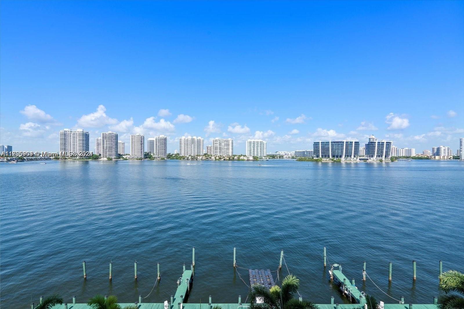 a view of a lake with a city