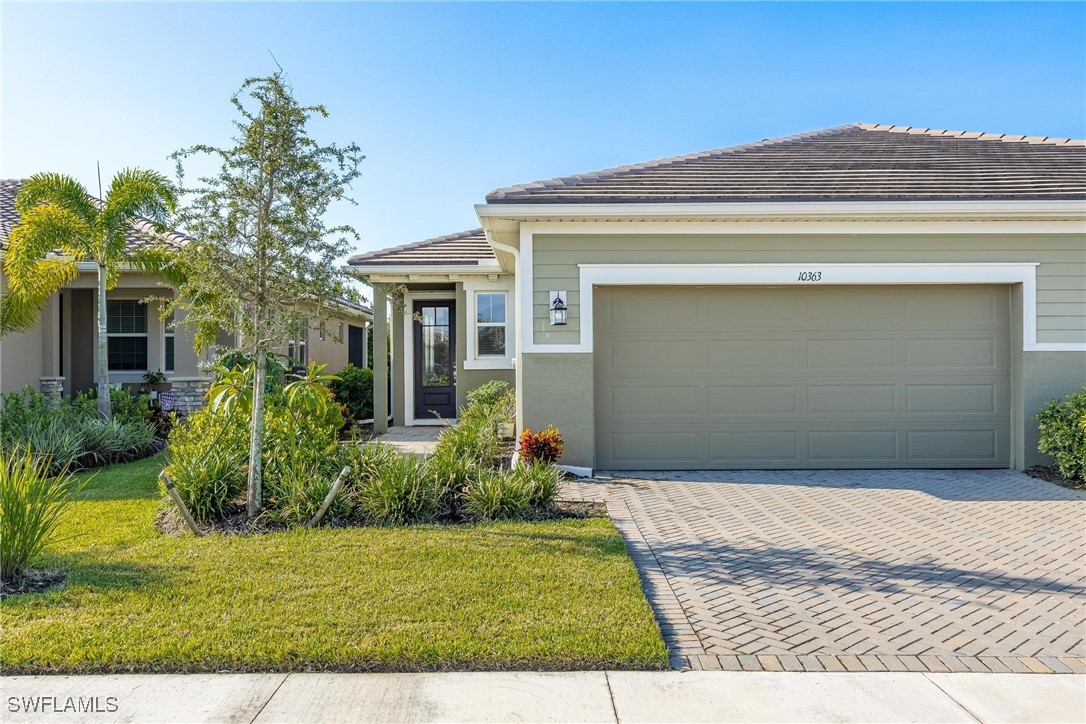 a front view of house with yard